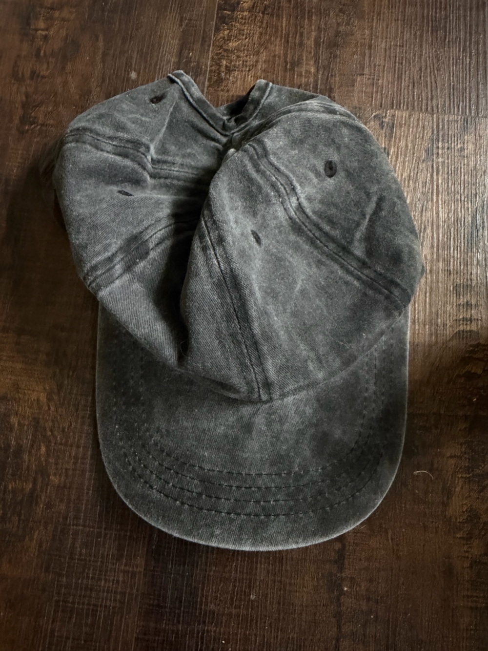 Grey black adjustable hat.
